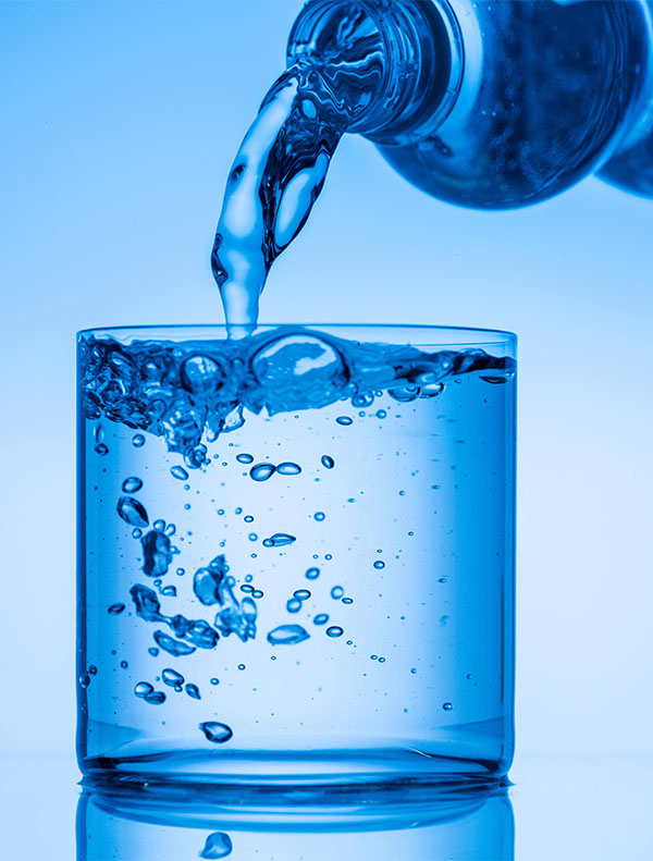 Pouring Clean Water in a Glass Pouring Clean Water in a Glass