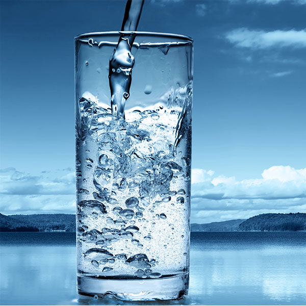 Pouring Water in a Glass